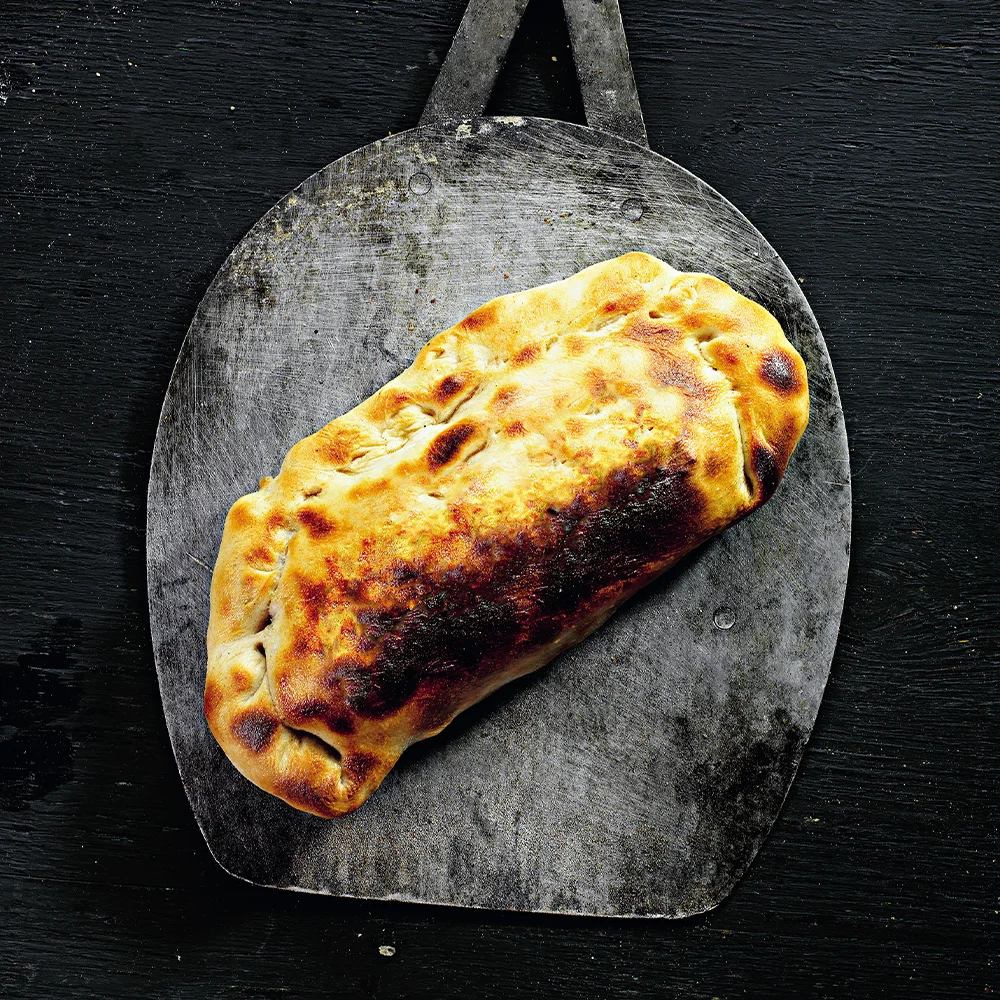 Pizza calzone by Tareq Taylor